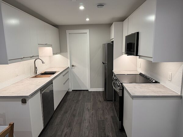 New Build Legal Basement with 1 Bedroom, pantry and one car parking.