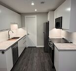 New Build Legal Basement with 1 Bedroom, pantry and one car parking.