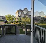Beautiful 2 Bedroom + Den Townhome with Attached Garage in Panorama Hills