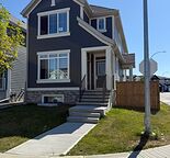 MAHOGANY-  4Br/3Bath MAIN Suite with Double Detached Garage