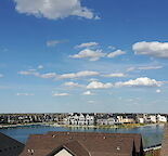 Top Floor Lake View Condo in Mahogany | 1 Bed + Large Den | Underground Parking