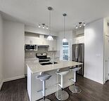 AIR CONDITIONING unit! Cozy 2 bedroom top floor unit
