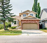 Great family home in Millrise, double attached garage 3 bedroom & den 3 baths