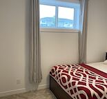 Cozy brand new 1 bed+ Den basement.