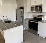 Brand-New Modern 2-Bedroom Condo in Aspen, Calgary. Prime Location