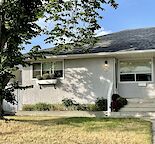Main floor of duplex close to downtown. Utilities included