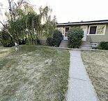 Main floor, pet friendly with fenced in yard, Utilities included,