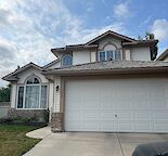 Cozy/ clean home with upgrades suitable for two families.