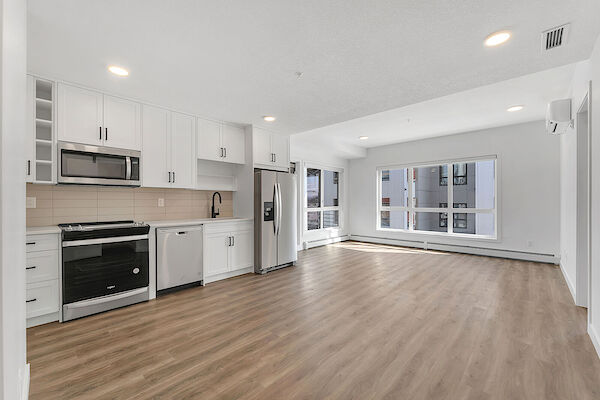 Modern 2 Bedroom + Den | 2 Full Bathrooms | Heated Underground Parking |