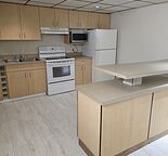 2 bedroom basement    1 bathroom with tub     full kitchen, island with stools