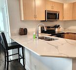 Fully Furnished, All-Inclusive 1 Bedroom + Den Condo – Downtown Calgary