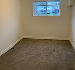 A bedroom in a basement suite – Quiet, Private, All Utilities Included