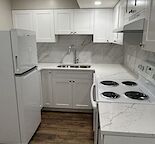 Newly Renod 3 BR bsmt-new kitchen/bath/floors+fenced yard+sound insul8d-pets ok