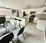 Very Large Renovated 2 Bed + Den Townhome with Underground Parking!!