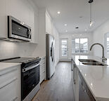 3 BEDROOM, 2 BATHROOM CORNER UNIT in WOLF WILLOW WITH 2 PARKING SPOTS!