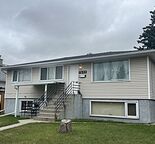 Cozy 2-bedroom basement unit with a private entrance, a garage, in-suite laundry