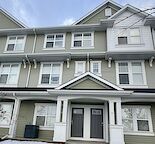Cozy Townhome w/ two car garage and driveway