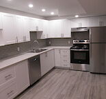 50% off first mo. Large 2bdrm lower, 1 year old suite, INCLUDES ALL UTILITIES.