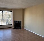 One bedroom& den, bath and a half Beltline condo with secure outdoor parking.