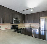 Cozy, Quiet & Well-Designed with In-Suite Laundry — Lower Mount Royal, Calgary