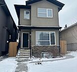 A Beautiful 1 cozy Room For Rent in our spacious 5 Bedroom Home in SE Calgary.