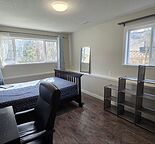 Bright, furnished room for rent-main floor-walking distance to UofC, LRT, Mall
