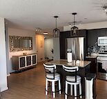 All Utilities Included -  Bright 2 Bed + Den - 2 bath Condo in Copperpond SE