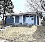 Move into this LUXURIOUS three-bedroom bungalow single family house