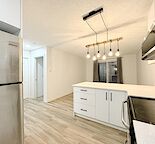 BRAND NEW FULLY RENOVATED TOP FLOOR CONDO AVAILABLE NOW!