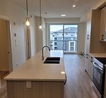 New 2 Bed +Den