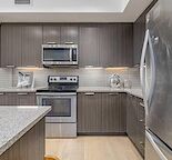 Cozy 2 bed room and bathroom condo and catholic school next door