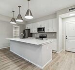 Beautifully designed 3-bedroom, 2-bathroom unit! Among the largest in the complex, Unit 106 comes complete with Mahogany