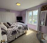 Master Bedroom in Charming Bowness Home