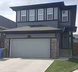 Modern 2 Bedroom Legal Walk-Out Basement
