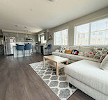 South Facing Corner Unit: Cozy 2 Bed + 2 Bath Underground Parking