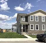 Beautifully designed, never-lived-in upper unit duplex!