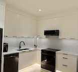 Luxury Fully Furnished Basement Suite with In- Suite Laundry