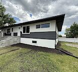 Newly Renovated main floor unit - utilities included - Pet friendly /fenced yard