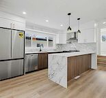 Fully Renovated & Upgraded Duplex with Separate Basement Suite — Prime Location