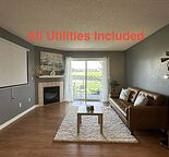 Furnished & All Utilities Included -Top-Floor 2 Bed 2 Bath Condo