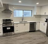 Walkout Basement Suite – Private Fenced Yard, In-Suite Laundry - Woodlands SW