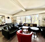 11 bedrooms. 1 large. 10 small/tiny. Or 4 bedroom pairs. 1 queen. 10 twins.