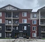 Spacious bright South Calgary Corner Condo in stunning Neighbourhood