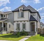 Beautifully Maintained 4-Bedroom Home in Calgary’s Premier Lake Community