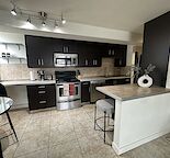 1 Bedroom For Rent in 2 Bedroom Fully Furnished Condo - Close To Downtown