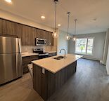 Modern 2 Bed 1 Bath Condo | Heated UG Parking | Storage  |