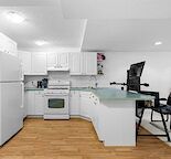 Bright 1-Bedroom + Den Basement in Killarney with Parking, A/C & Laundry