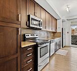 Bright & Modern 1 Bedroom In Desired Auburn Bay With A/C!