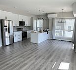 Cozy corner unit in a quiet building, walking distance to South Health Campus