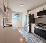 Beautifully Renovated 3-Bedroom Main Floor with Custom Kitchen and Private Yard
